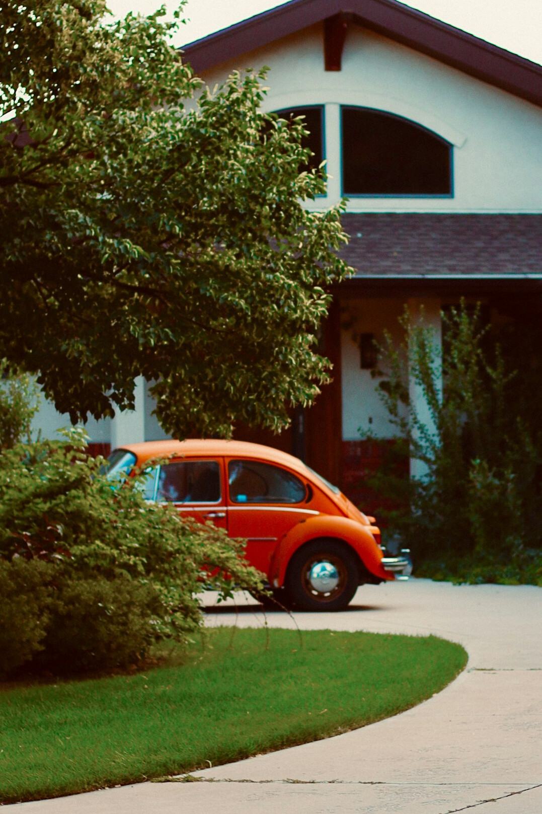 luxury car parked in driveway