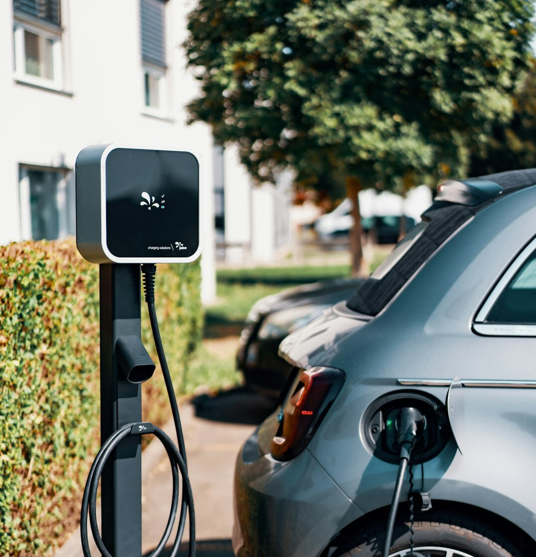 electric car charging at station